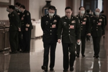 Ngày 11/03/2023, đại biểu quân đội ĐCSTQ tham dự lưỡng hội. (Ảnh: Greg Baker/AFP)