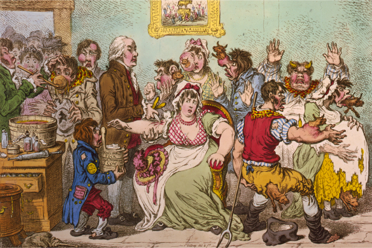 Đã có tranh cãi lịch sử xung quanh việc chích ngừa bệnh đậu mùa. Trong phim hoạt hình châm biếm của James Gillray, công bố năm 1802, vaccine đậu bò đang được chích cho những phụ nữ trẻ đang sợ hãi tại Bệnh viện chủng ngừa và Đậu mùa. Bò “mọc ra” từ cơ thể người, làm phóng đại những tuyên bố trước đó về việc những người phát triển các đặc điểm của bò sau khi chích ngừa. (Ảnh: Wikimedia Commons)