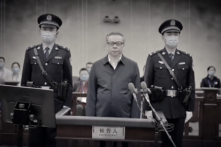 Ông Bạch Thiên Huy (Bai Tianhui) tại một phiên tòa xét xử tại Trung Quốc. (Ảnh: Từ video của NTD)